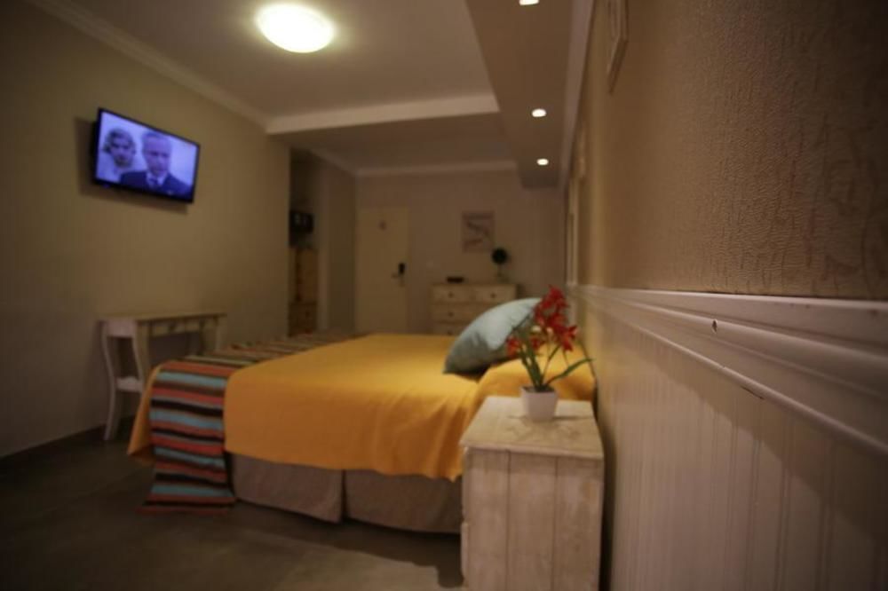 Club House Hotel Вилья-Карлос-Пас Экстерьер фото